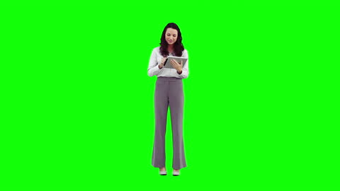 Woman in Office Attire Using Tablet Against Green Background