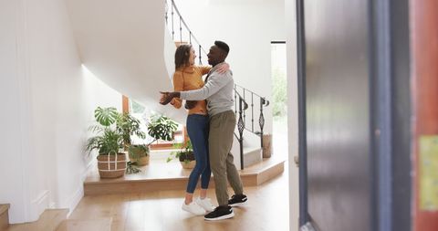 Joyful Couple Dancing in Their Home - Download Free Stock Images Pikwizard.com