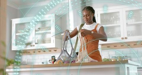 Woman organizing fresh produce in mesh bags for sustainable living