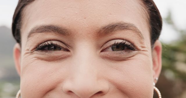 Close-up Smiling Woman with Natural Skin and Defined Eyes - Download Free Stock Images Pikwizard.com