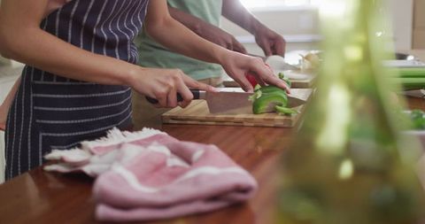Couple Preparing Fresh Vegetables Together in Kitchen