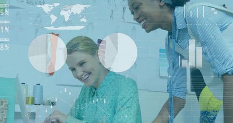 Diverse female designers collaborating with data insights