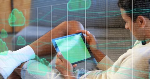 Man Using Digital Tablet with Data Processing Overlay