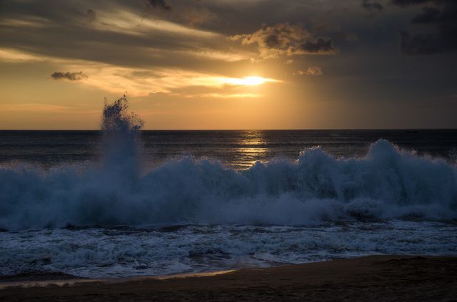 Powerful Ocean Waves Crashing at Sunset - Download Free Stock Photos Pikwizard.com