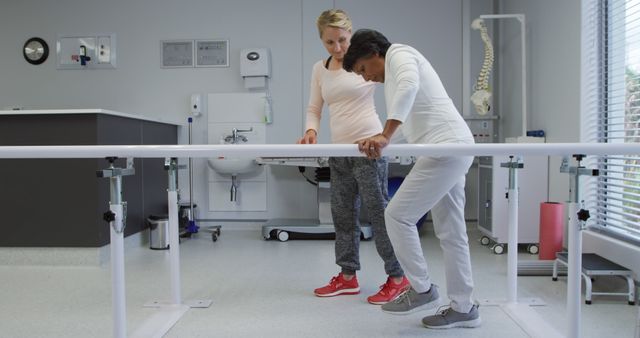 Physiotherapist Assisting Woman with Rehabilitation Exercises - Download Free Stock Images Pikwizard.com