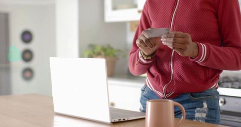 Home Online Shopping Comfort with Credit Card in Kitchen