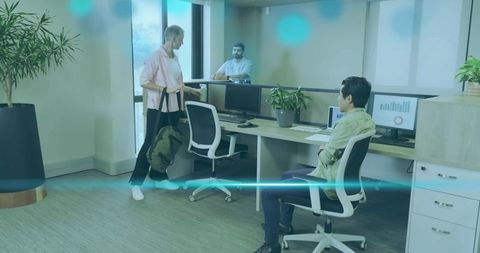 Modern Office Environment with Collaborative Team Meeting