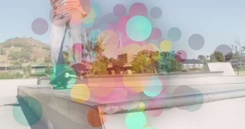 Multicolored Abstract Overlay on Skateboarding Scene