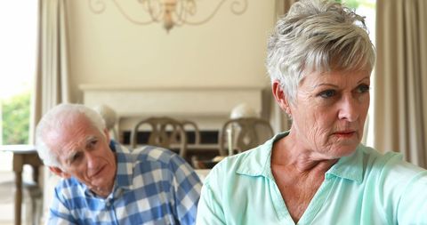 Senior Couple Having Confrontation in Living Room