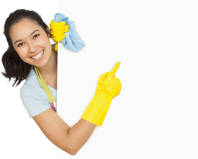 Woman Cleaning and Pointing at Blank Transparent Space With Rubber Gloves - Download Free Stock Videos Pikwizard.com