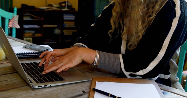 Woman Typing on Laptop at Wooden Desk in Office - Download Free Stock Images Pikwizard.com