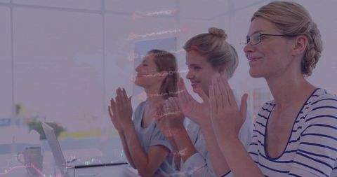 Businesswomen Applauding with Data and DNA Overlay Concept