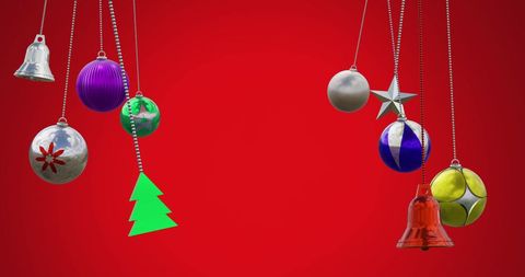 Colorful Holiday Ornaments Swinging on Red Background