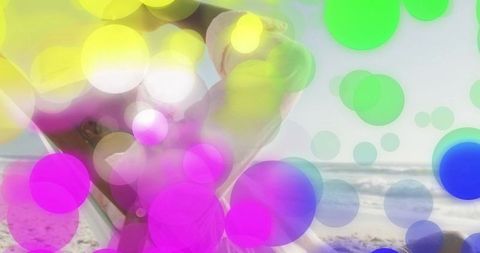 Relaxing on Beach: Mature Man Enjoying Sunny Atmosphere with Bokeh Effect