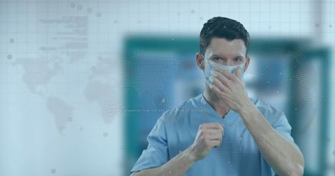 Healthcare worker fitting mask in modern hospital setting