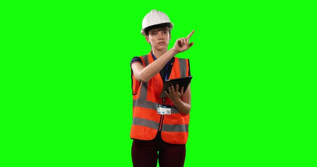 Safety Advisor in High Visibility Gear Holding Tablet - Download Free Stock Images Pikwizard.com