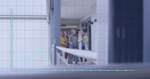 Diverse Professionals Analyzing Digital Data At Modern Office