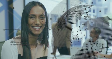 Professional Collaborating with Colleagues in Modern Office with Data Overlay