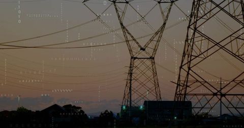 Dusk power grid silhouettes binary overlay framing steel lattice pylons and substation