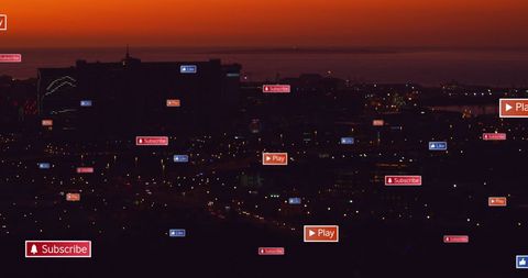 Digital Notifications Overlaying Urban Evening Cityscape