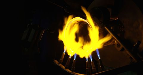 Artisanal Glassmaking with Torches and Flames in Action