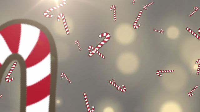 Scatter of festive candy canes falling over blurred warm lights evokes holiday spirit and Christmas charm. Ideal for seasonal greetings, festive invitations, digital Christmas cards, and holiday-themed presentations.