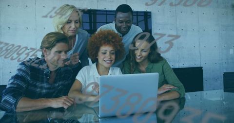 Diverse Team Engaging With Futuristic Laptop Interface
