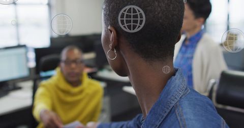 Colleagues interacting amid digital global connection icons