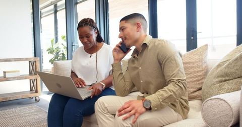 Multiracial Business Team Collaborating with Technology