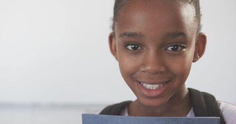 Smiling Student with Backpack Ready for School Day - Download Free Stock Images Pikwizard.com
