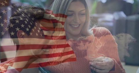 Smiling Couple Relaxing with American Flag Overlay