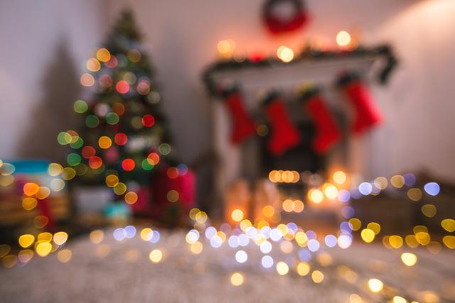 This image captures a cozy and festive living room decorated for Christmas with a defocused view of a Christmas tree, fireplace, and stockings. The bokeh effect creates a warm and inviting atmosphere, perfect for holiday-themed designs, greeting cards, social media posts, and advertisements promoting Christmas and winter celebrations.