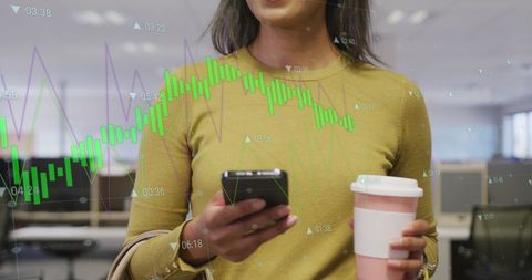 Tech-Savvy Businesswoman Analyzing Financial Graphs