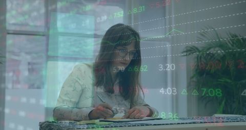 Businesswoman Analyzing Stock Market Trends with Data Overlays - Download Free Stock Images Pikwizard.com