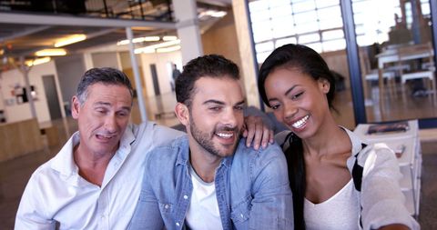 Cheerful Team Taking Selfie in Modern Office Environment - Download Free Stock Images Pikwizard.com