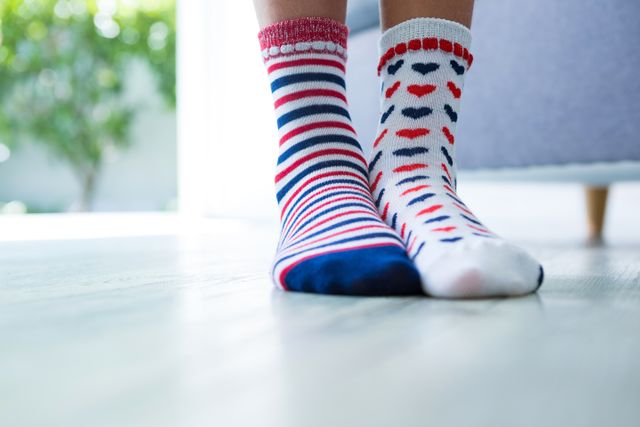 Girl Wearing Mismatched Socks at Home - Download Free Stock Photos Pikwizard.com