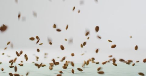 Falling Almonds on Clean Bright Background - Download Free Stock Images Pikwizard.com