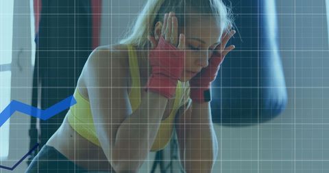 Tired Boxer Amidst Digital Data Overlay Symbolizing Fitness Analytics
