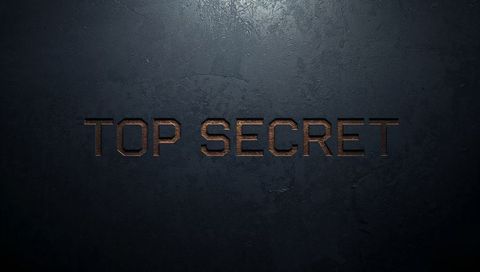 Top secret recessed rusted copper lettering on dark industrial metal vault door texture