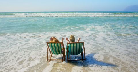 Senior Couple Enjoying Beach Vacation Relaxation - Download Free Stock Images Pikwizard.com