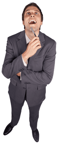 Surprised caucasian businessman looking up with pen on transparent background