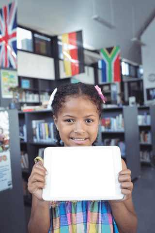 smiling girl holding tablet computer in bright modern library - Download Free Stock Videos Pikwizard.com