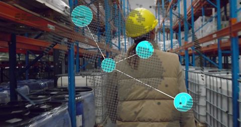 Industrial inspector analyzing warehouse with technology overlay