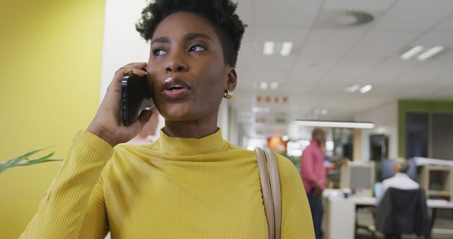 Confident Businesswoman Talking on Phone in Office Setting - Download Free Stock Images Pikwizard.com