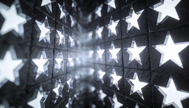 Glowing star tunnel with mirror reflections repeating led cutout pattern kaleidoscope
