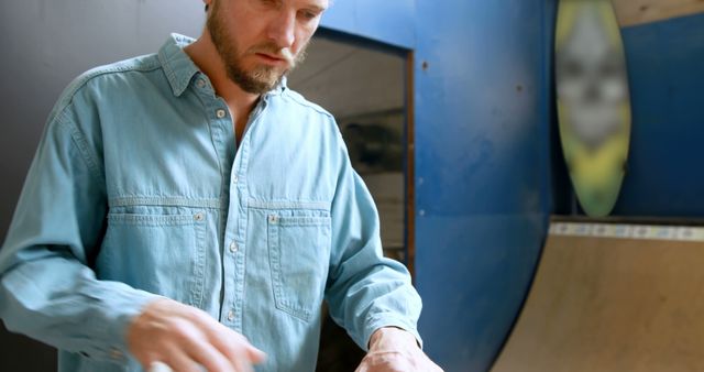 Man Concentrating in Skateboard Park Wearing Denim Shirt - Download Free Stock Images Pikwizard.com