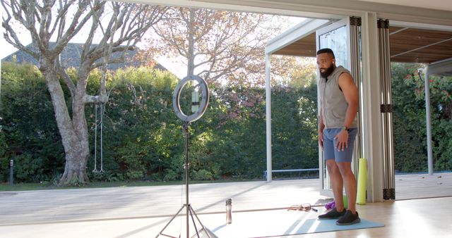 Man Preparing for Outdoor Home Workout with Ring Light - Download Free Stock Images Pikwizard.com