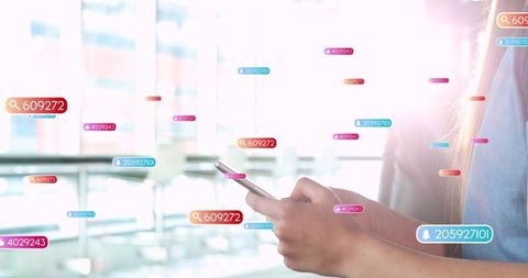 Commuter tapping smartphone with floating notification overlays in sunlit transit concourse