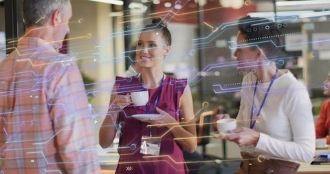 Professionals networking over coffee in coworking space with digital circuit overlay