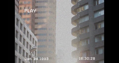 Retro Cityscape with Vintage VHS Date Stamp